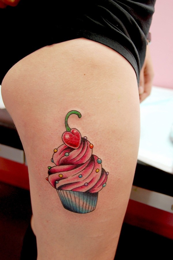 Realistic Cupcake Tattoo On Rib Side