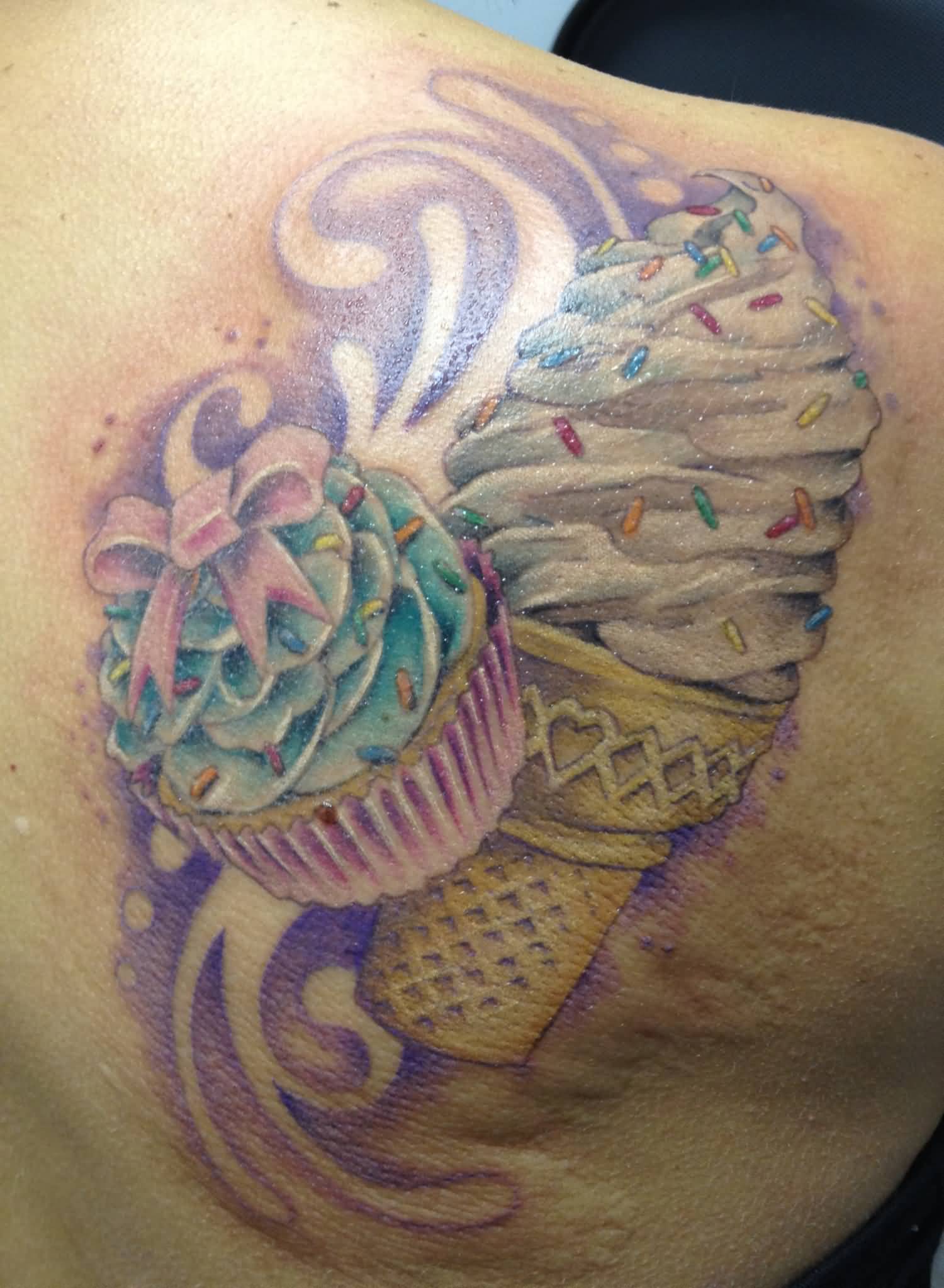 Realistic Cupcake Tattoo On Right Back Shoulder