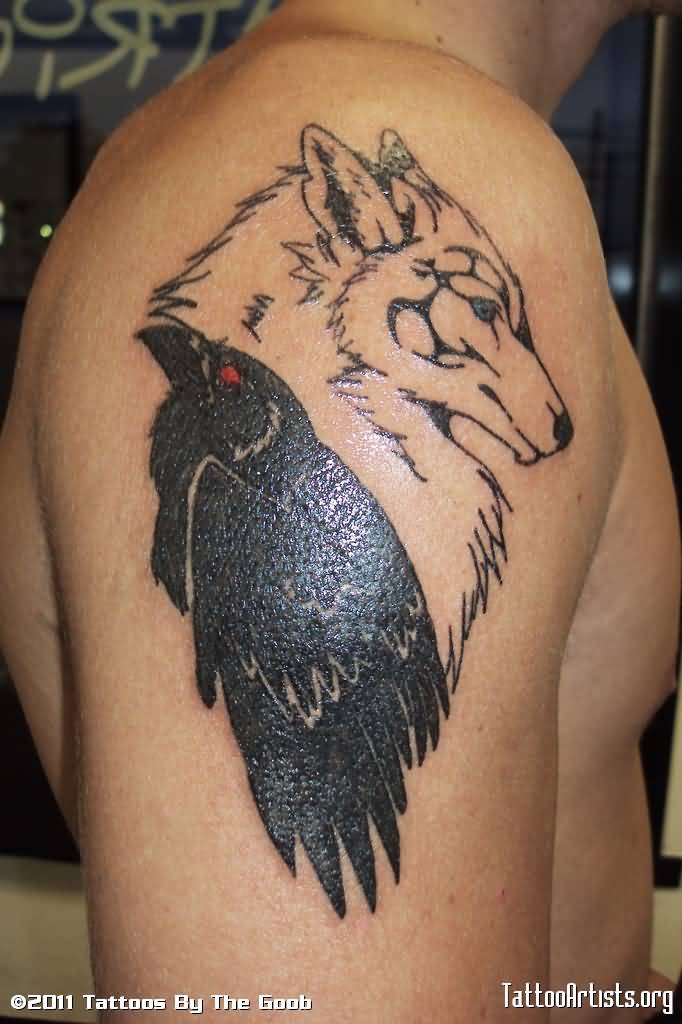 Red Eye Black Raven And Wolf Head Tattoo On Man Right Shoulder