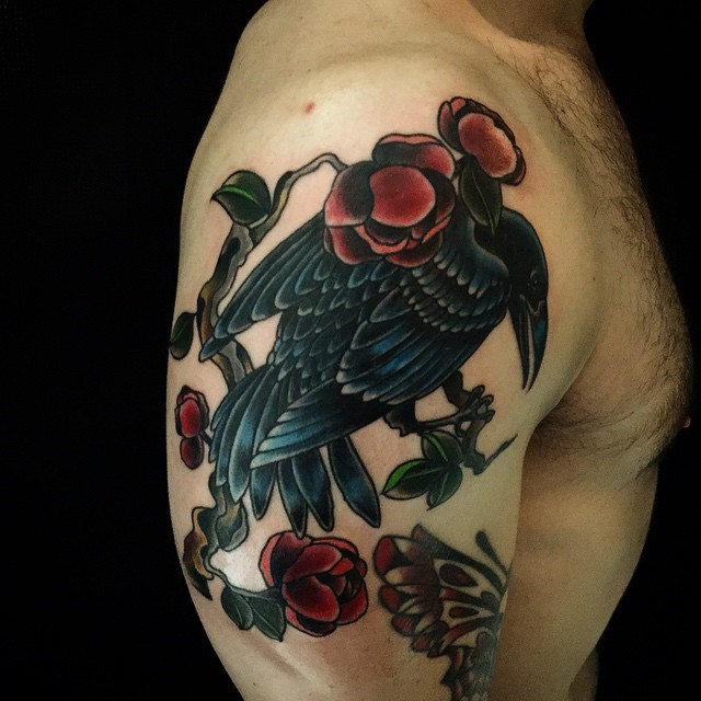 Red Flowers And Raven Tattoo On Man Right Shoulder