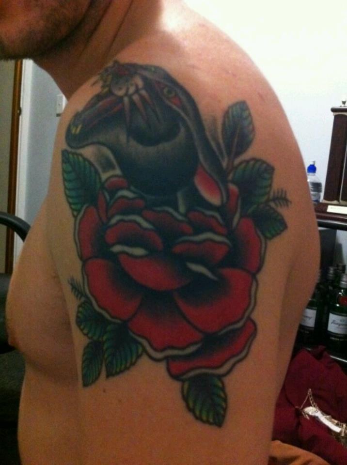 Red Rose And Panther Head Tattoo On Man Left Shoulder