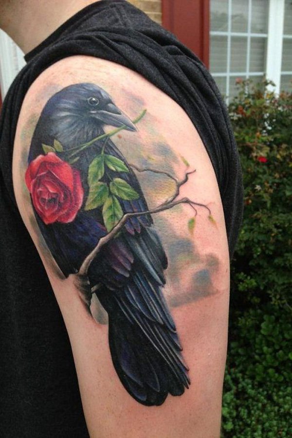 Red Rose In Raven Beak Tattoo On Man Left Half Sleeve