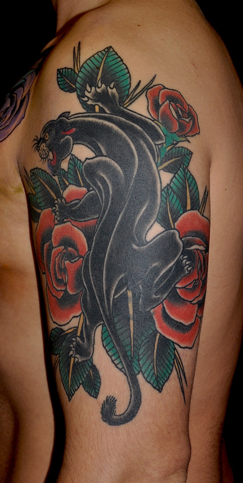 Red Roses And Black Panther Tattoo On Left Half Sleeve