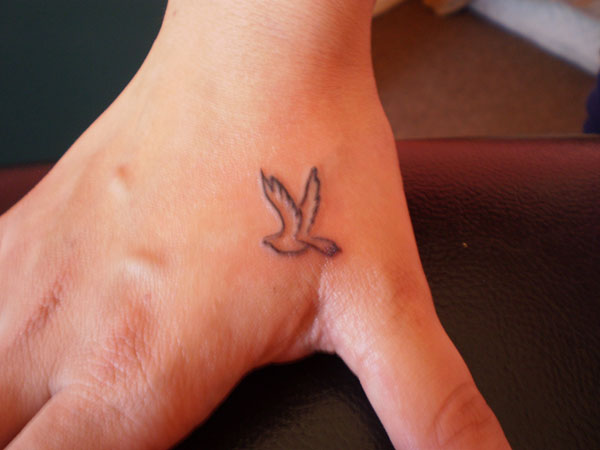 Right Hand Outline Small Dove Tattoo