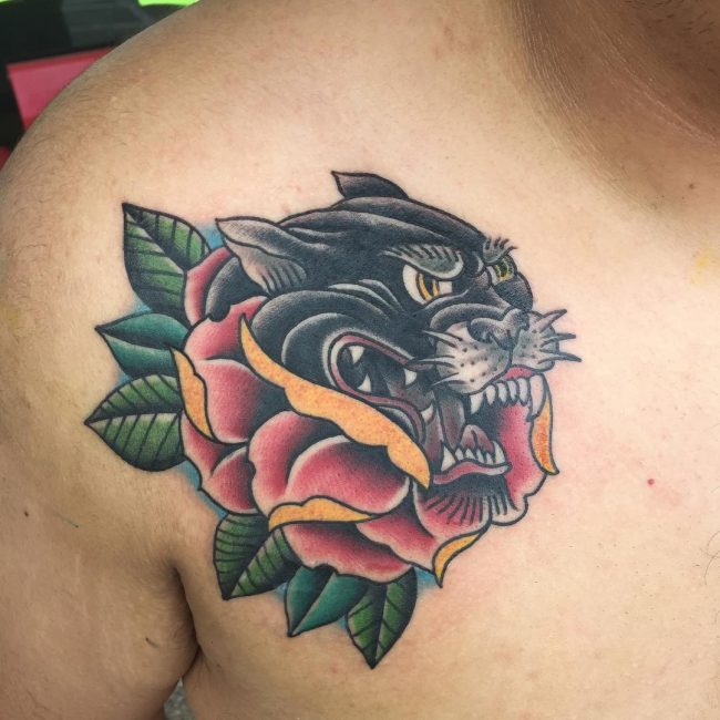 Rose Flower And Black Panther Head Tattoo On Front Shoulder