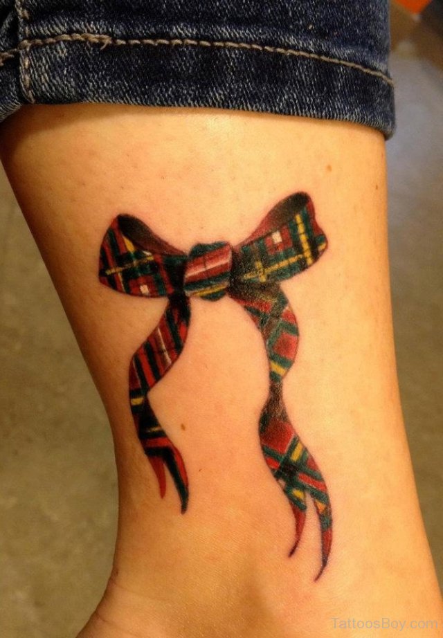 Scottish Bow Tattoo On Side Leg
