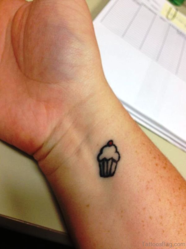 Simple Cupcake Tattoo On Right Wrist