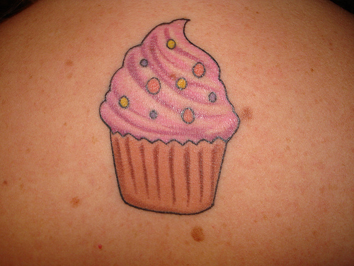 Simple Cupcake Tattoo On Upper Back