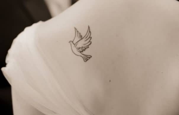 Simple Flying Dove Tattoo On Left Back Shoulder