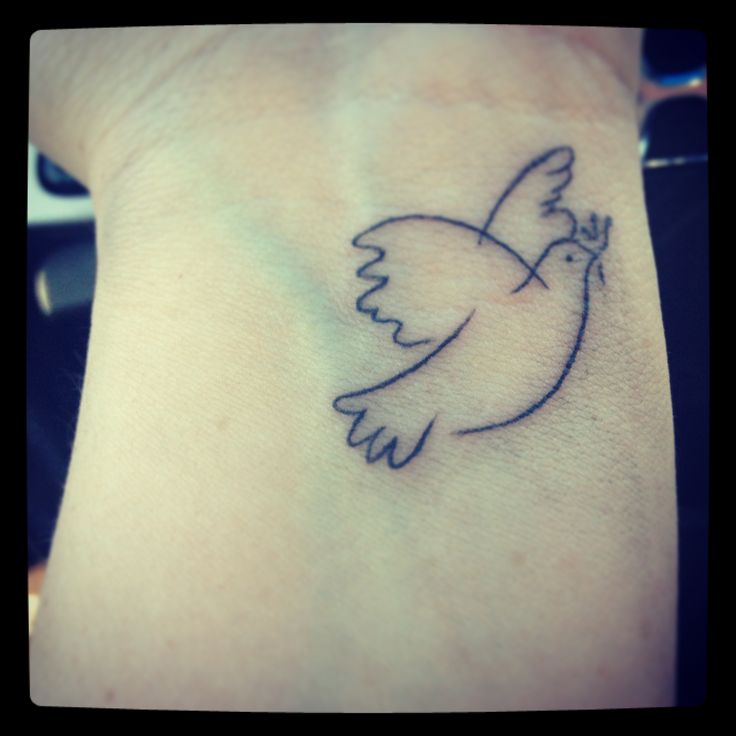 Simple Outline Flying Dove Tattoo On Left Wrist