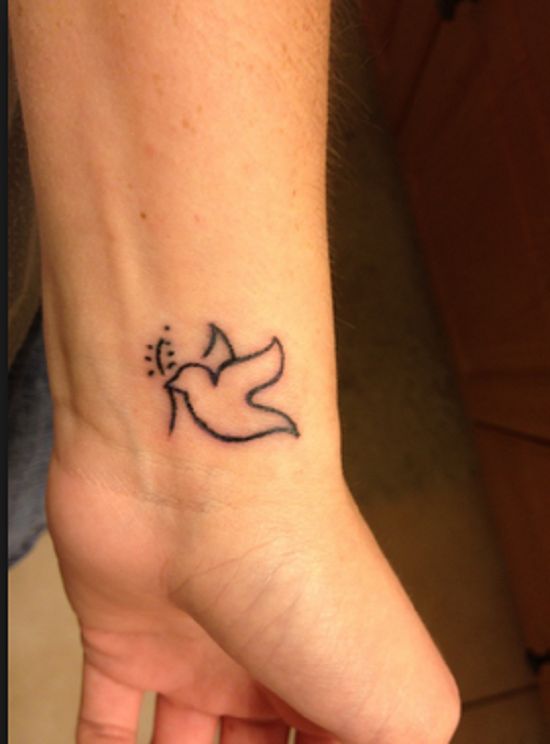 Simple Peace Dove Tattoo On Left Wrist