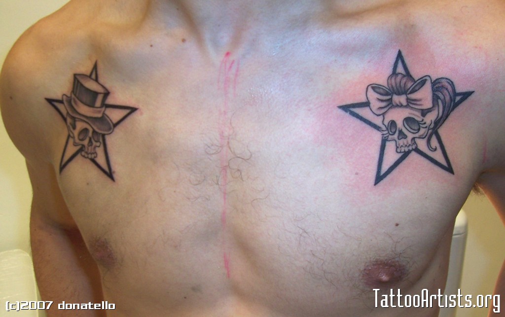 Skulls In Star Tattoo On Man Front Shoulders