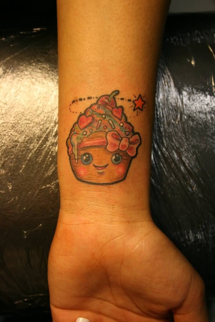 Small Cupcake Tattoo On Left Forearm