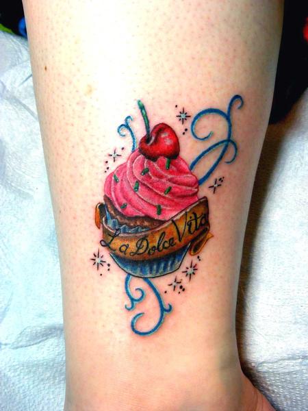 Small Cupcake Tattoo On Side Leg