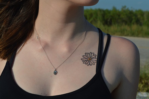 Small Daisy Tattoo On Front Shoulder