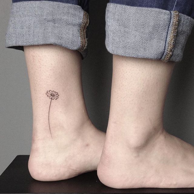 Small Daisy Tattoo On Side Ankle