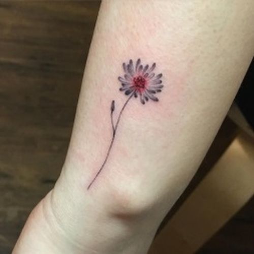 Small Daisy Tattoo On Side Wrist