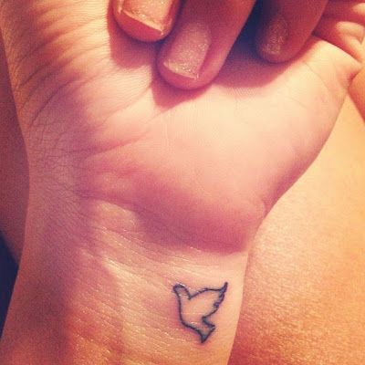 Small Dove Tattoo On Left Wrist