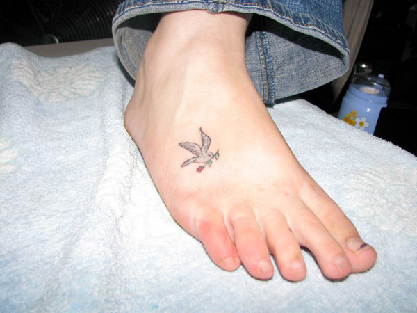 Small Dove Tattoo On Right Foot