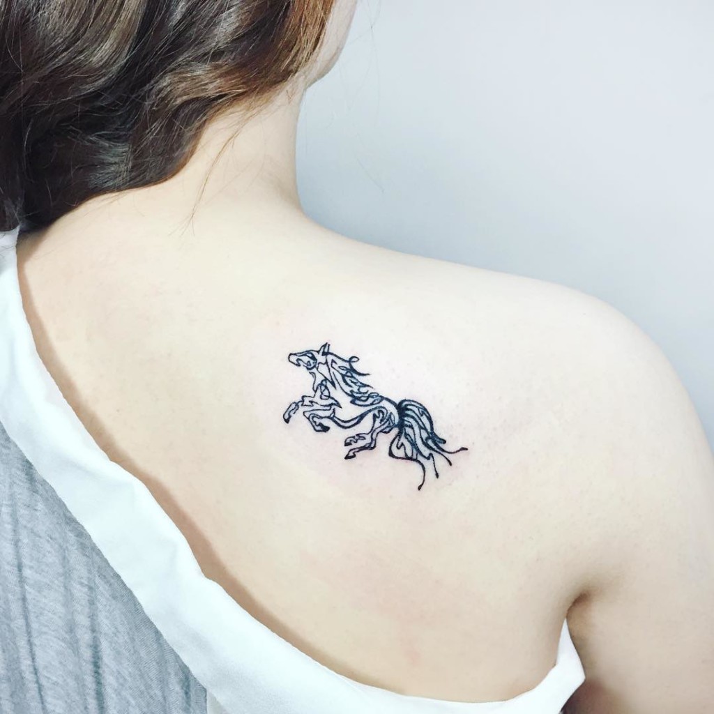 Small Horse Tattoo On Girl Right Back Shoulder