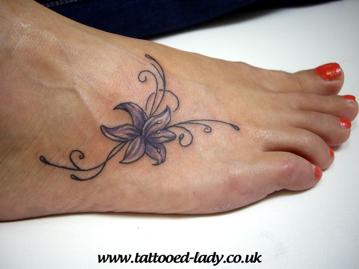 Small Lily Flower Tattoo On Girl Right Foot