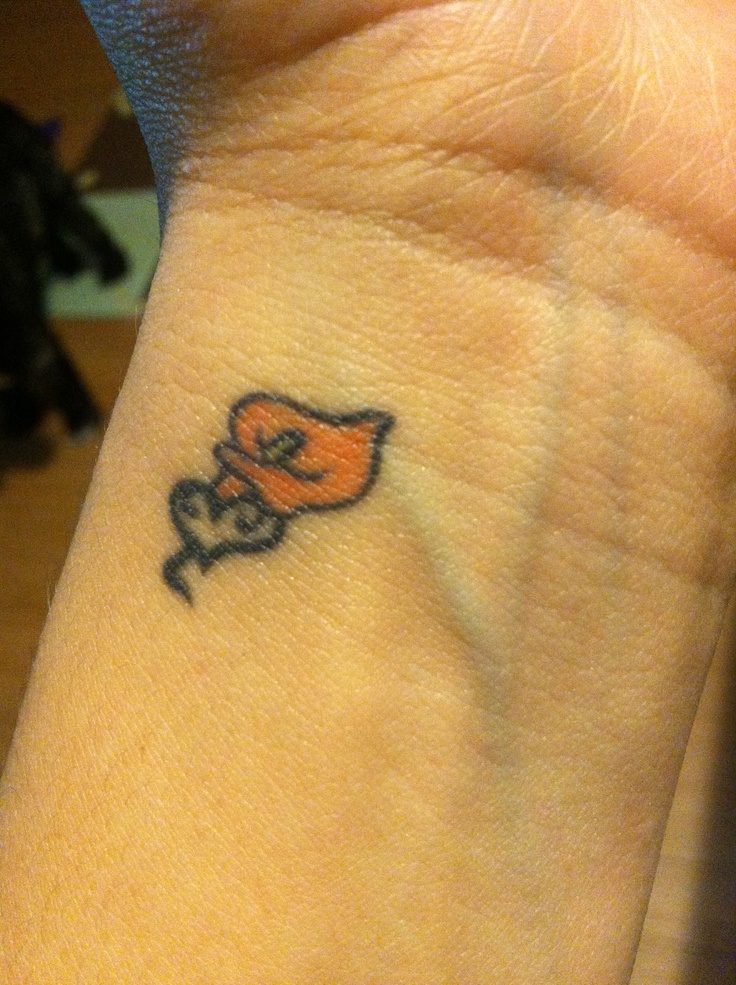 Small Lily Tattoo On Wrist