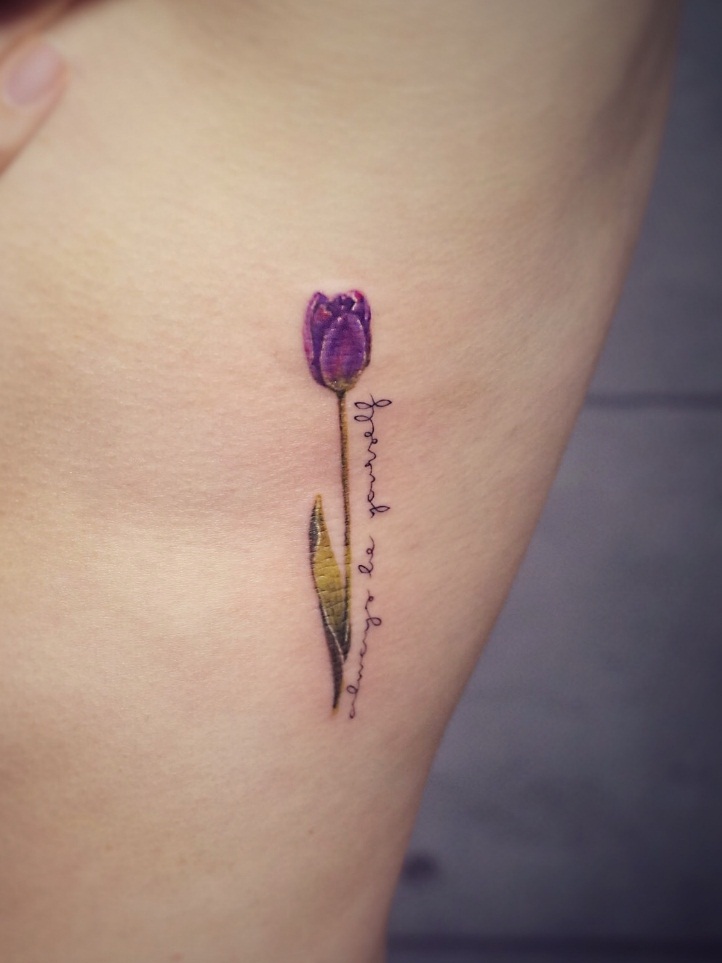 Small Purple Tulip Flower Tattoo On Side Rib