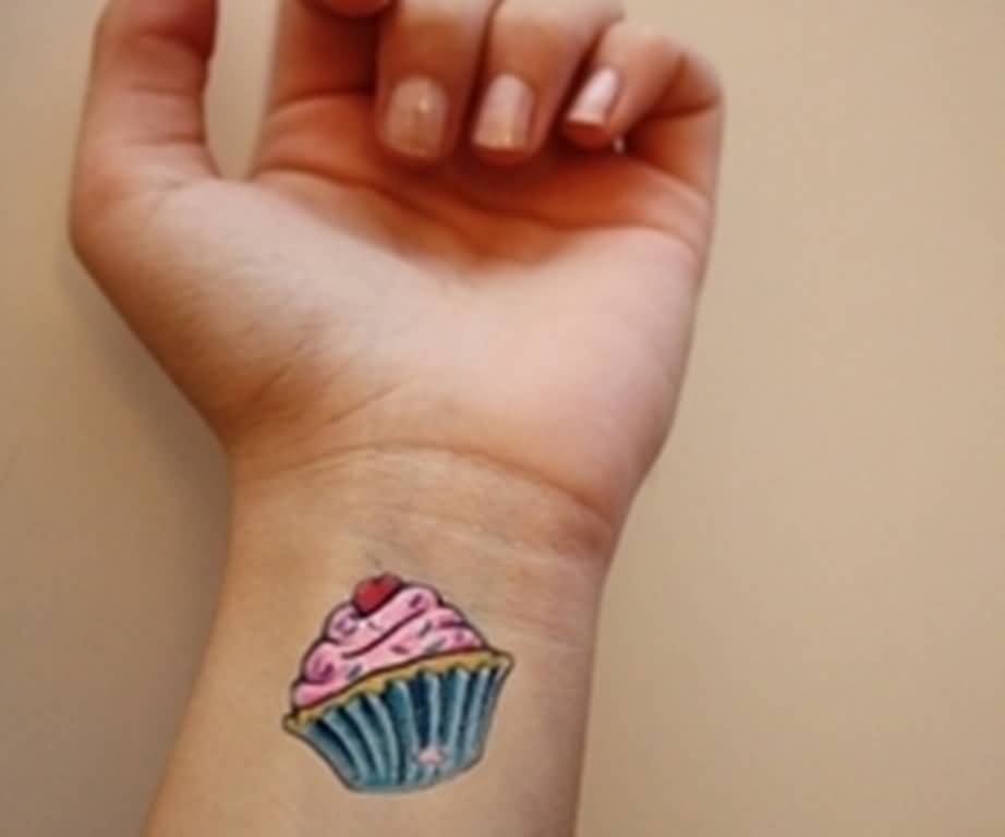 Small Realistic Cupcake Tattoo On Left Wrist