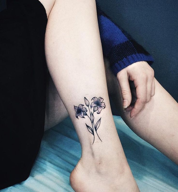 Small Small Lily Tattoos On Side Leg