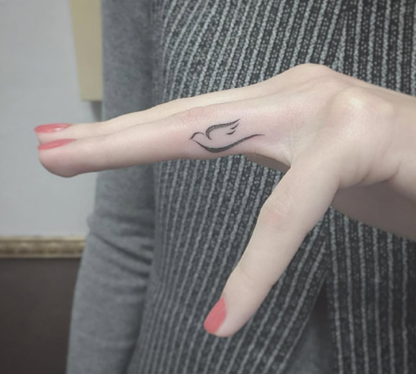 Small Tribal Small Dove Tattoo On Side Finger
