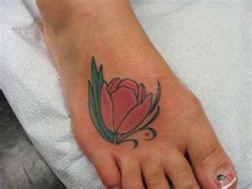 Small Tulip Flower Tattoo On Right Foot