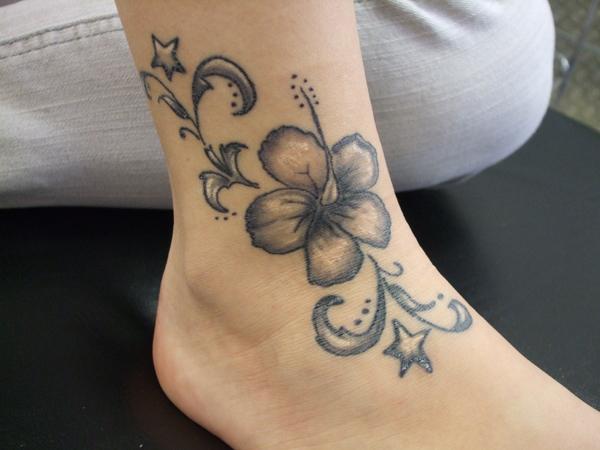 Stars And Lily Flower Tattoo On Ankle