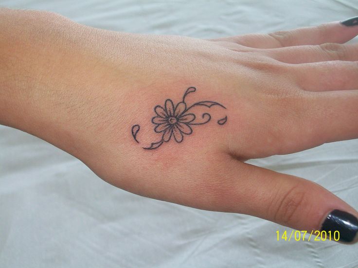 Tiny Daisy Flower Tattoo On Girl Left Hand