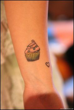 Tiny Heart And Simple Cupcake Tattoo On Forearm