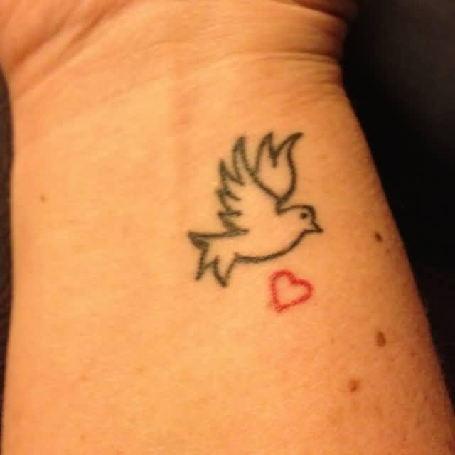 Tiny Red Heart And Outline Flying Dove Tattoo On Wrist