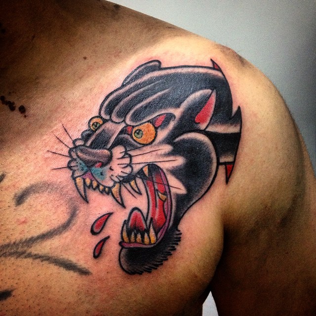 Traditional Black Panther Tattoo On Man Front Shoulder