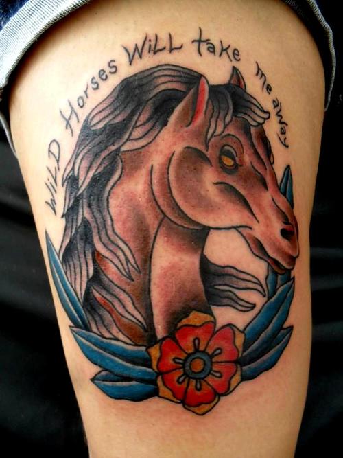 Traditional Flower And Horse Head Tattoo On Thigh