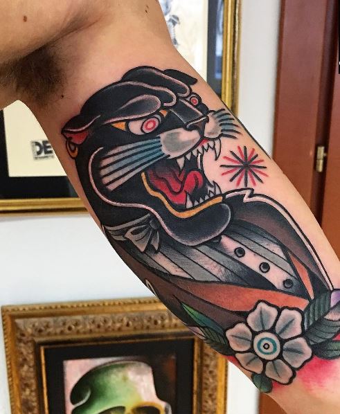 Traditional Panther Tattoo On Man Inner Bicep