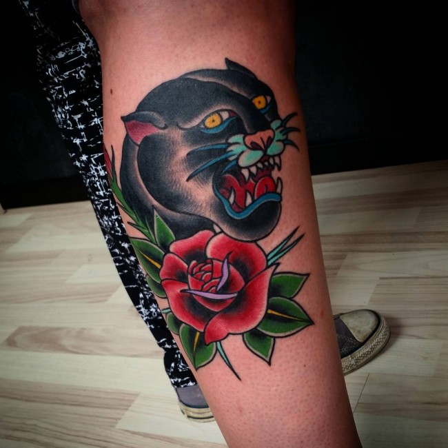 Traditional Rose Flower And Panther Head Tattoo On Leg