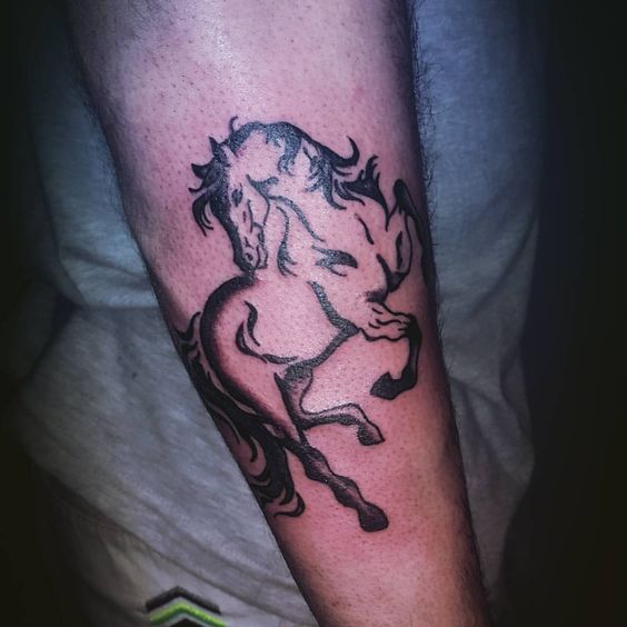 Tribal Outline Horse Tattoo On Arm Sleeve