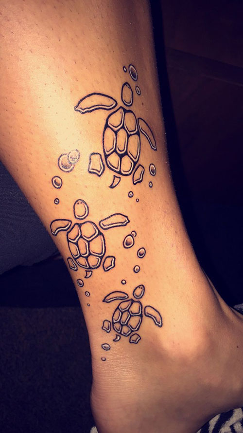 Turtles Under Water Tattoo On Side Leg