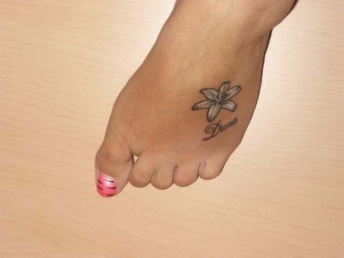 White And Grey Lily Flower Tattoo On Left Foot