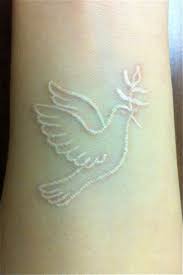 White Ink Flying Dove Tattoo