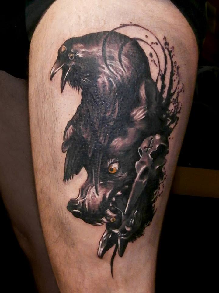 Yellow Eye In Wolf Head Tattoo On Left Thigh