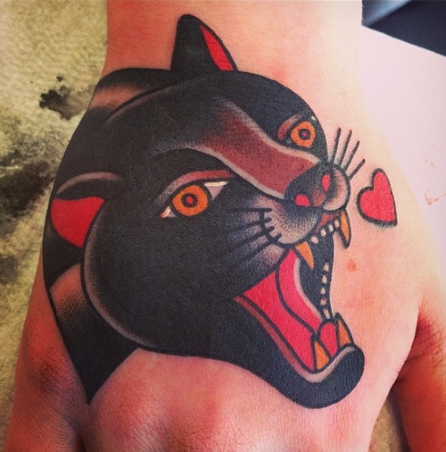 Yellow Eyes Angry Panther Tattoo On Hand