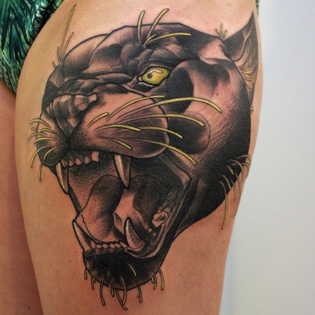 Yellow Eyes Grey Panther Tattoos On Girl Left Thigh