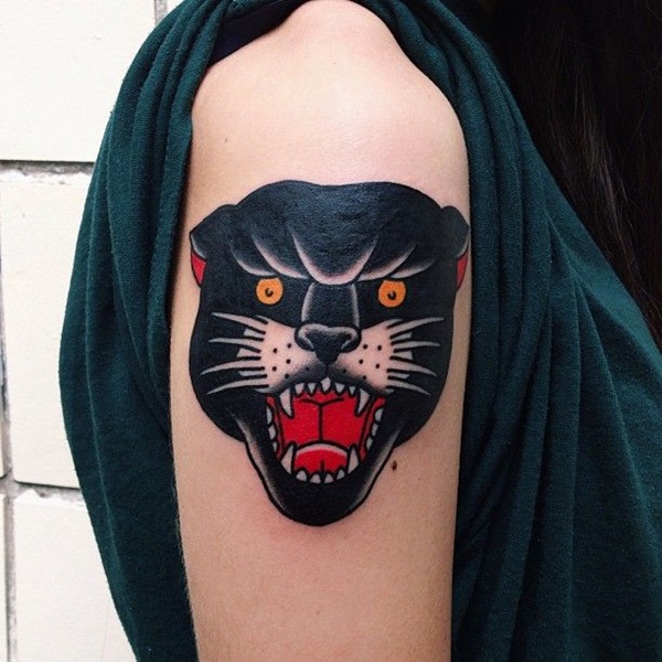 Yellow Eyes In Panther Head Tattoo On Right Bicep