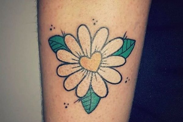 Yellow Heart In White Daisy Tattoo On Right Bicep