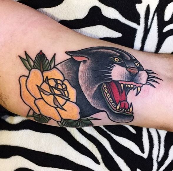 Yellow Rose And Traditional Panther Tattoo On Arm Sleeve