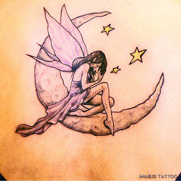 Yellow Stars And Fairy On Moon Tattoo On Back